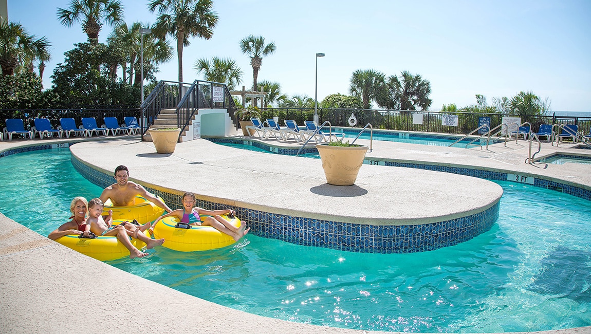Family at the outdoor lazy river