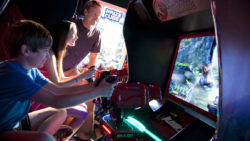 Kids playing at the arcade